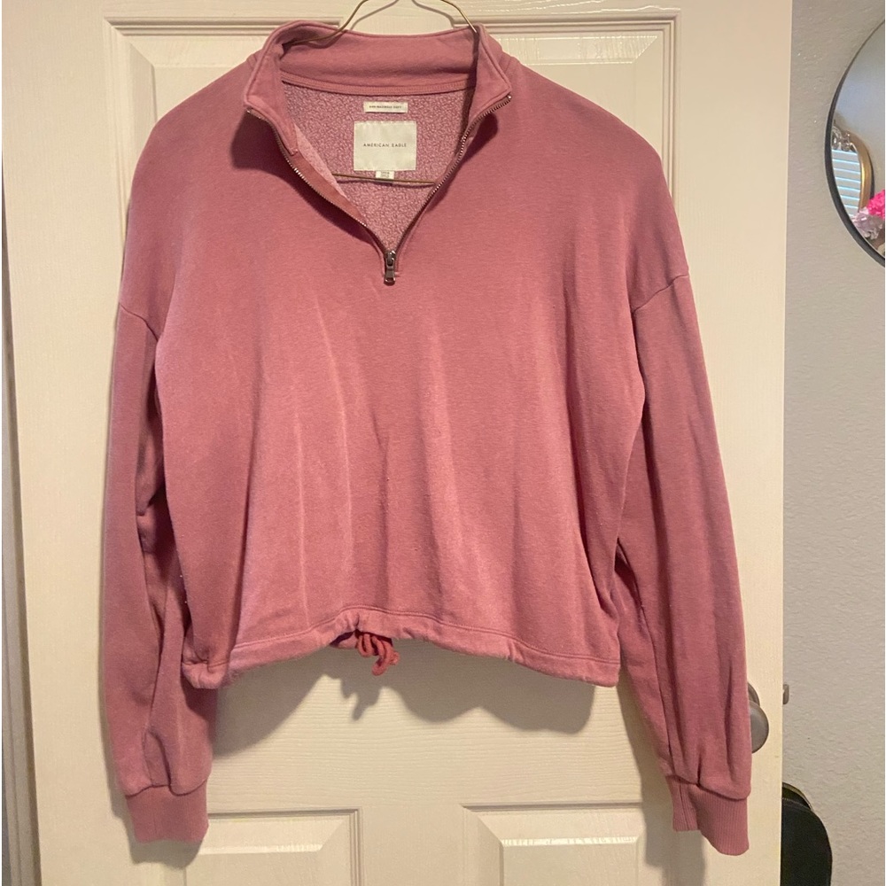 mid cropped jacket with jaw string on the bottom with zipper